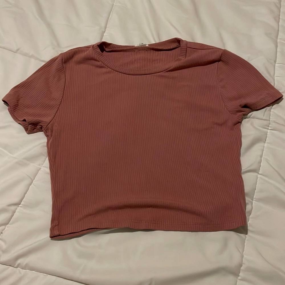 Pink short sleeve shirt, size medium from garage never worn.